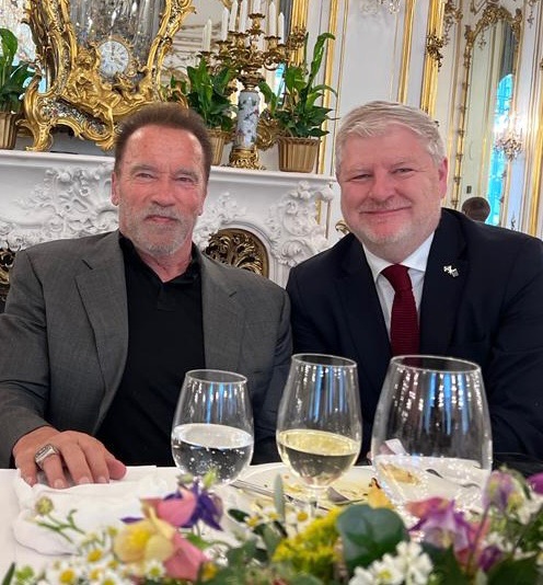 With Arnold Schwarzenegger, Austria.
