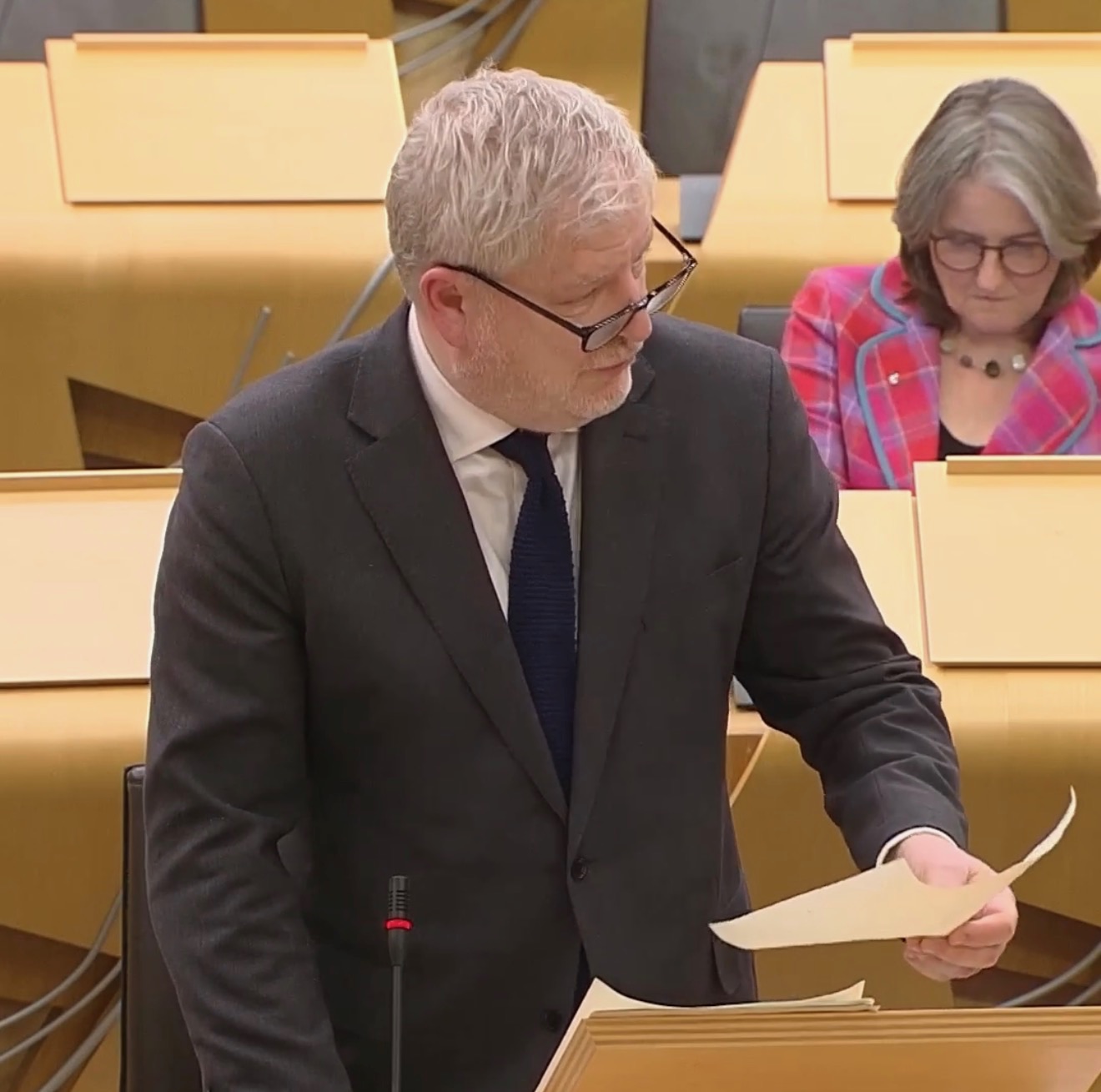 At the dispatch box, Scottish Parliament.